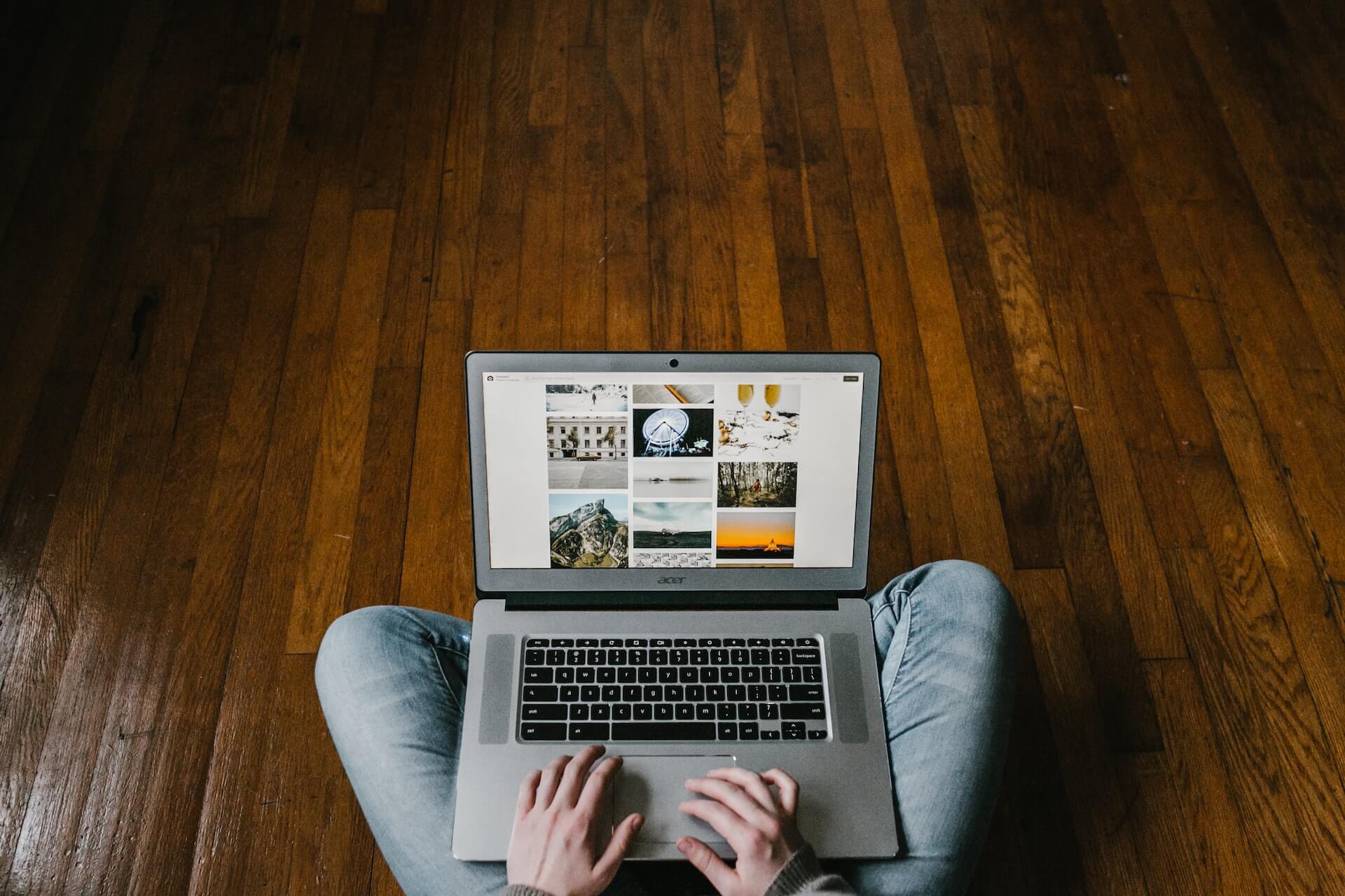 Work from home person working on laptop on floor